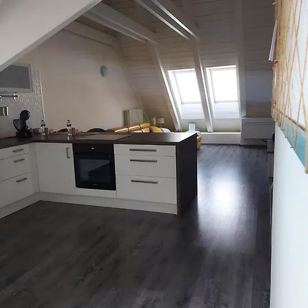 V Podkrovi Maly Pariz *